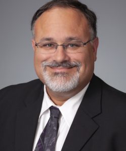 Professional headshot of Michael Lang, MD, FACP, DFAPA
