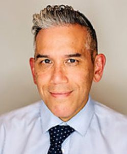 Professional headshot of John Onate, MD