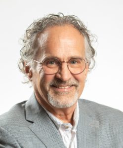 Professional headshot of Luther Philaya, MD