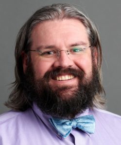 Professional headshot of Samuel Vaughn, MD, PhD